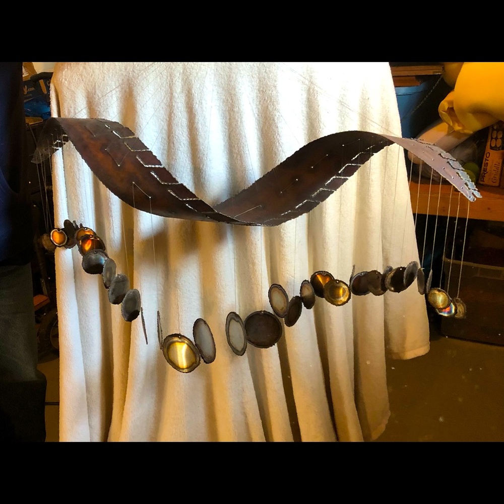 Metal wind chimes by Artist Bill Cook
